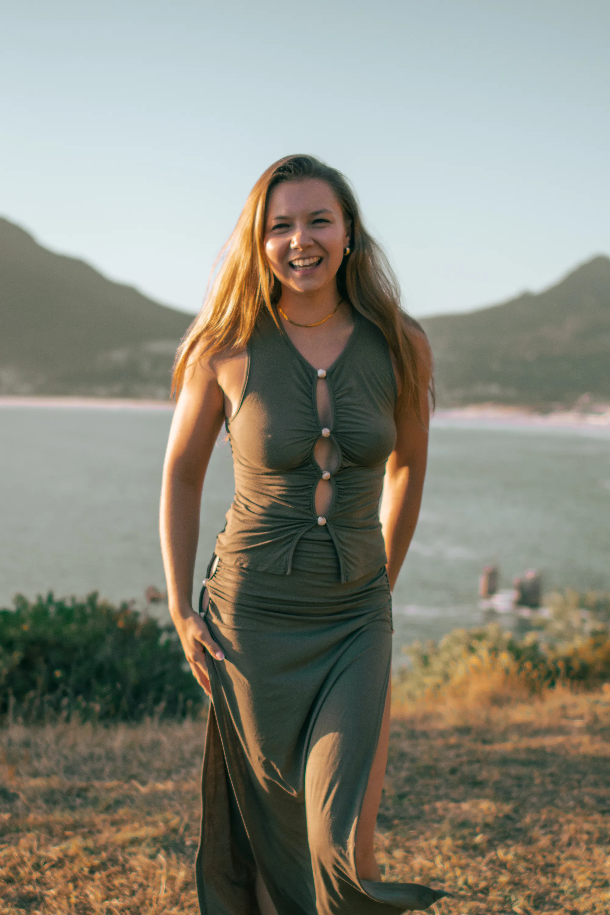 Madison Griffin smiling in green dress