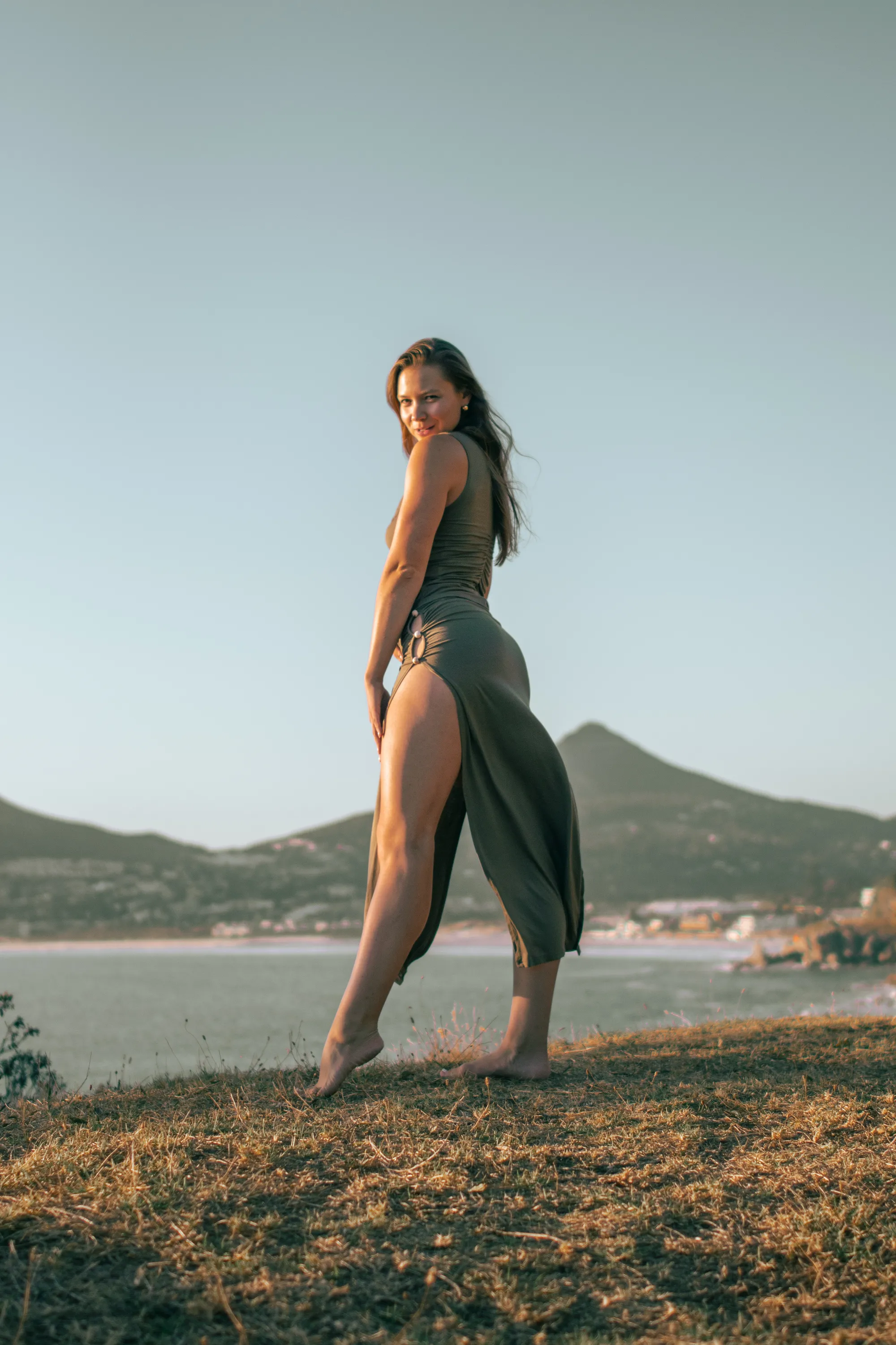 Madison Griffin overlooking mountains and ocean